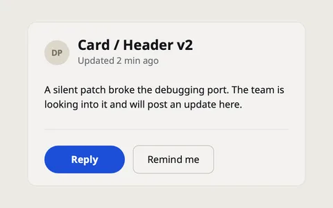 The same card with a gray surface, the title renamed to v2, and a rounder, darker button.