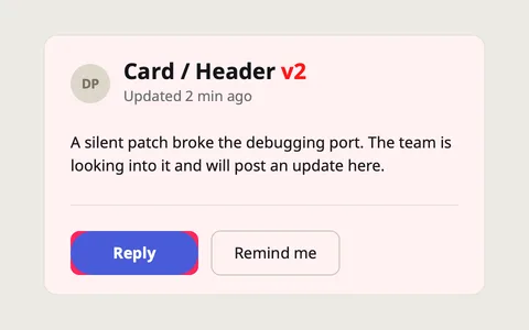 The card with the changed pixels painted red: the v2 suffix and the button's edges.